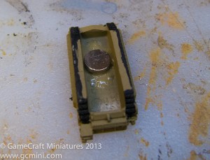 Step 4:  Open up the hole in the hull to the same size at the turret magnet if necessary (in this M1 it was not necessary) and then glue the larger hull magnet inside the hull